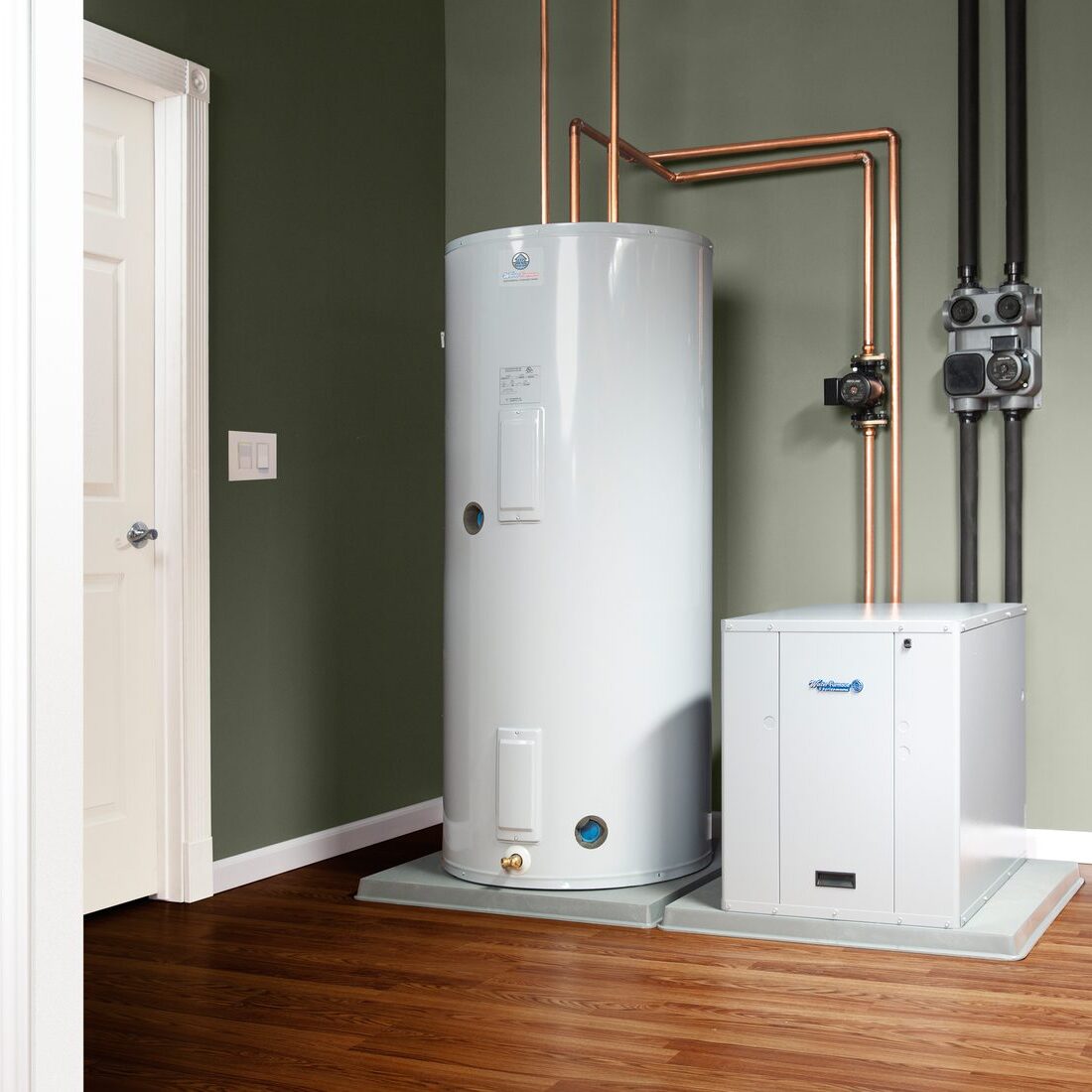 WaterFurnace ground source heat pump and buffer tank indoor installation